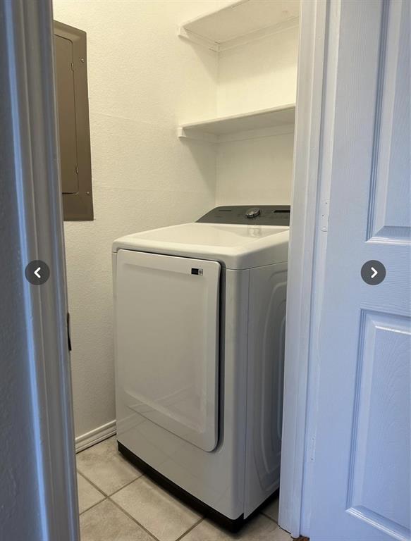 1882 Signal Ridge Place, Unit 1882 Rockwall, TX 75032 - Photo 17 of 19 a utility room with dryer and washer
