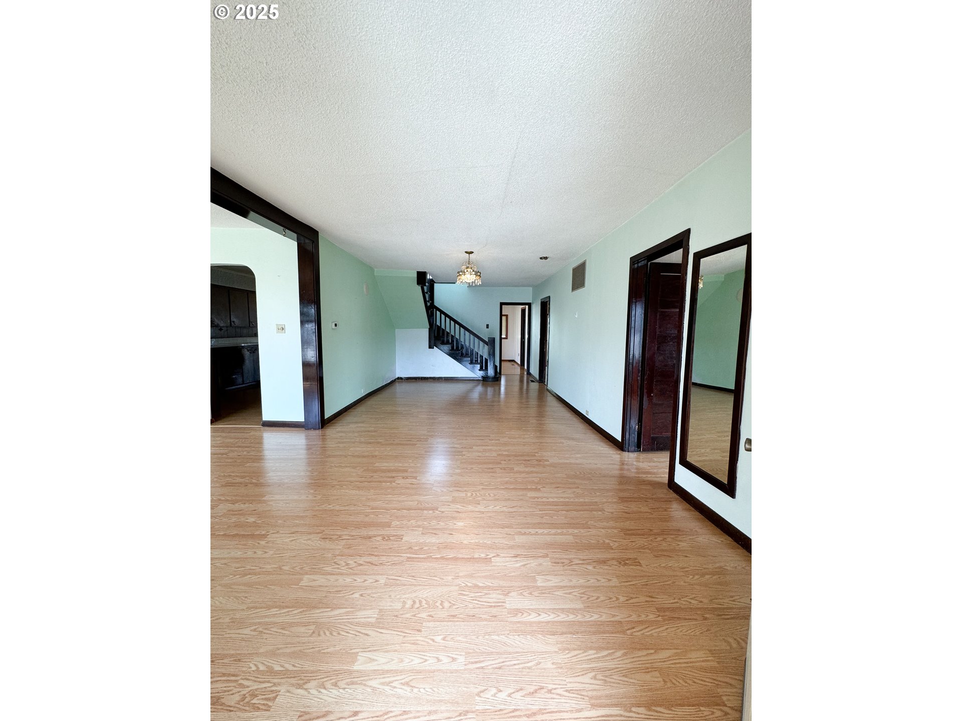 1050 Elm Street Baker City, OR 97814 - Photo 2 of 28 a view of a livingroom with furniture and staircase