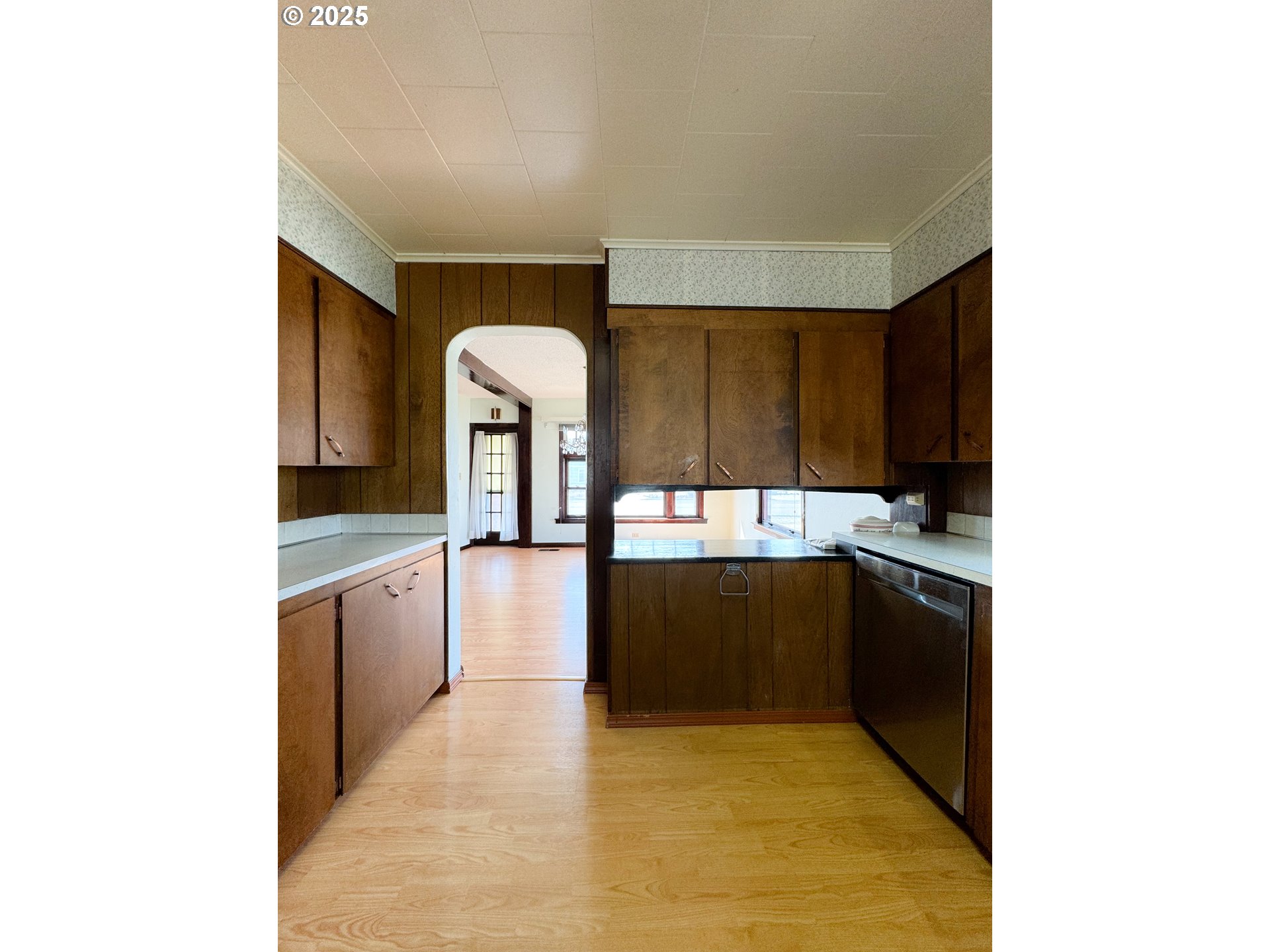 1050 Elm Street Baker City, OR 97814 - Photo 5 of 28 a large kitchen with stainless steel appliances granite countertop a sink and cabinets