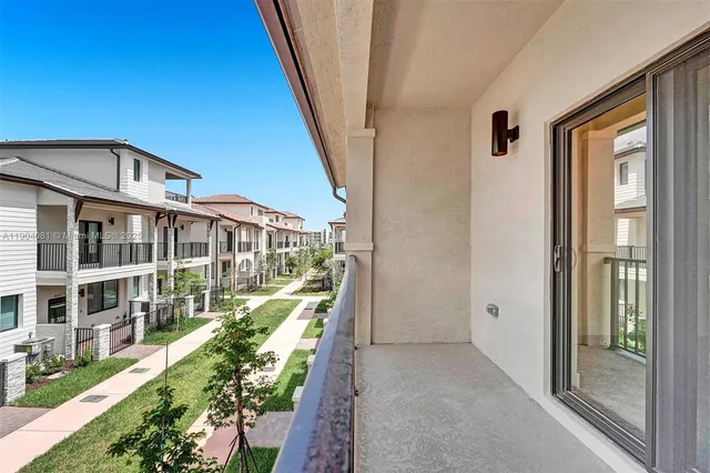 a view of an house with porch and wooden floor
