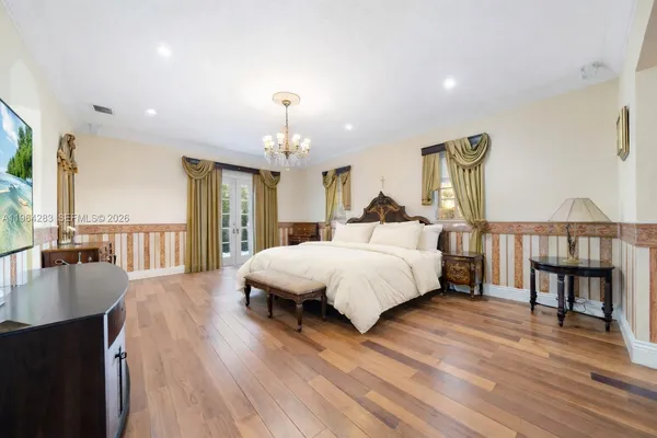 a large living room with a large window