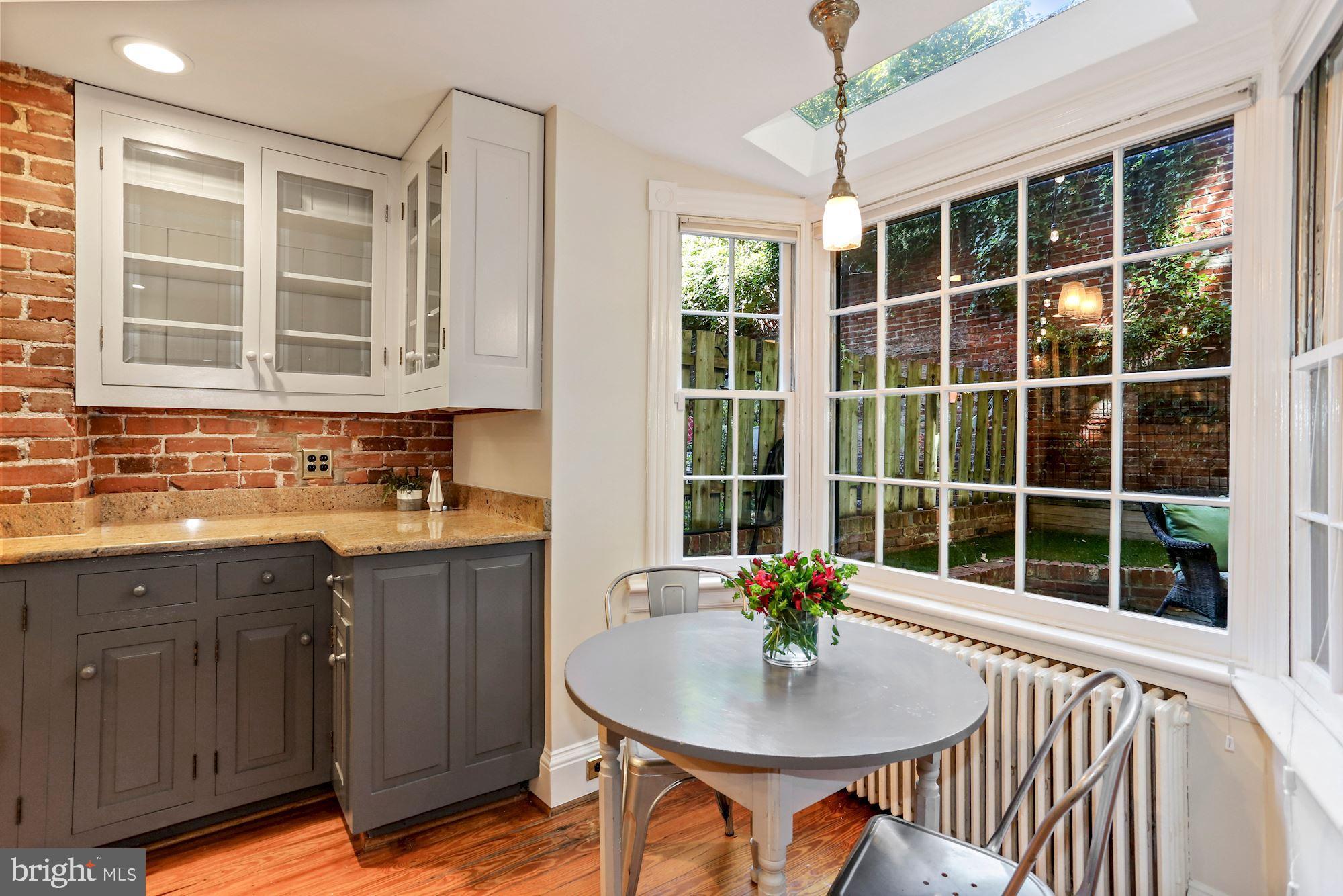 107 5th Street Southeast Washington, DC 20003 - Photo 14 of 32 Eat-in kitchen bay window looking to garden