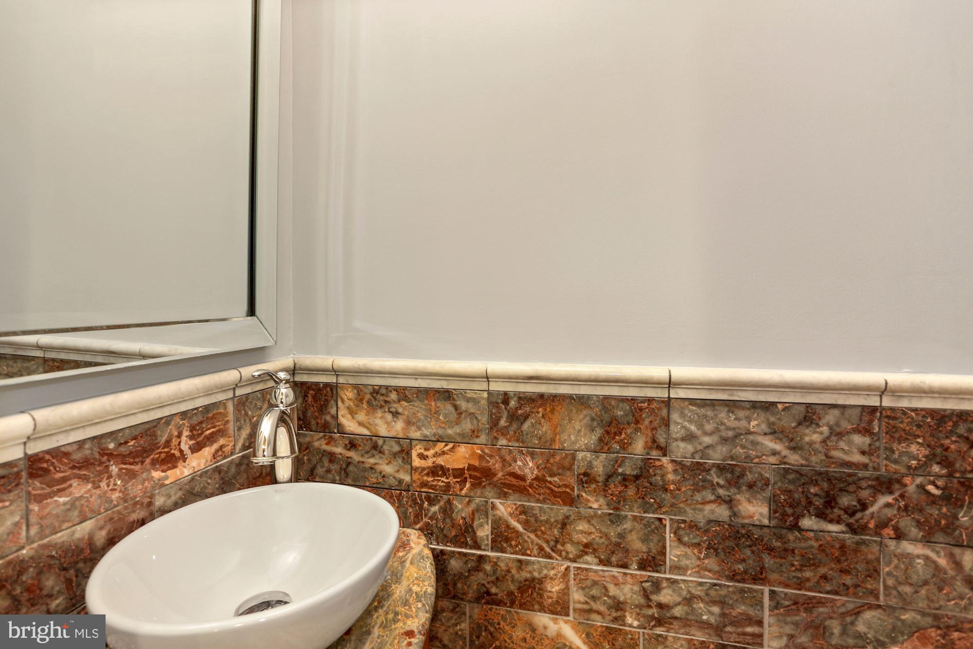 107 5th Street Southeast Washington, DC 20003 - Photo 20 of 32 1/2 bath off family room and kitchen