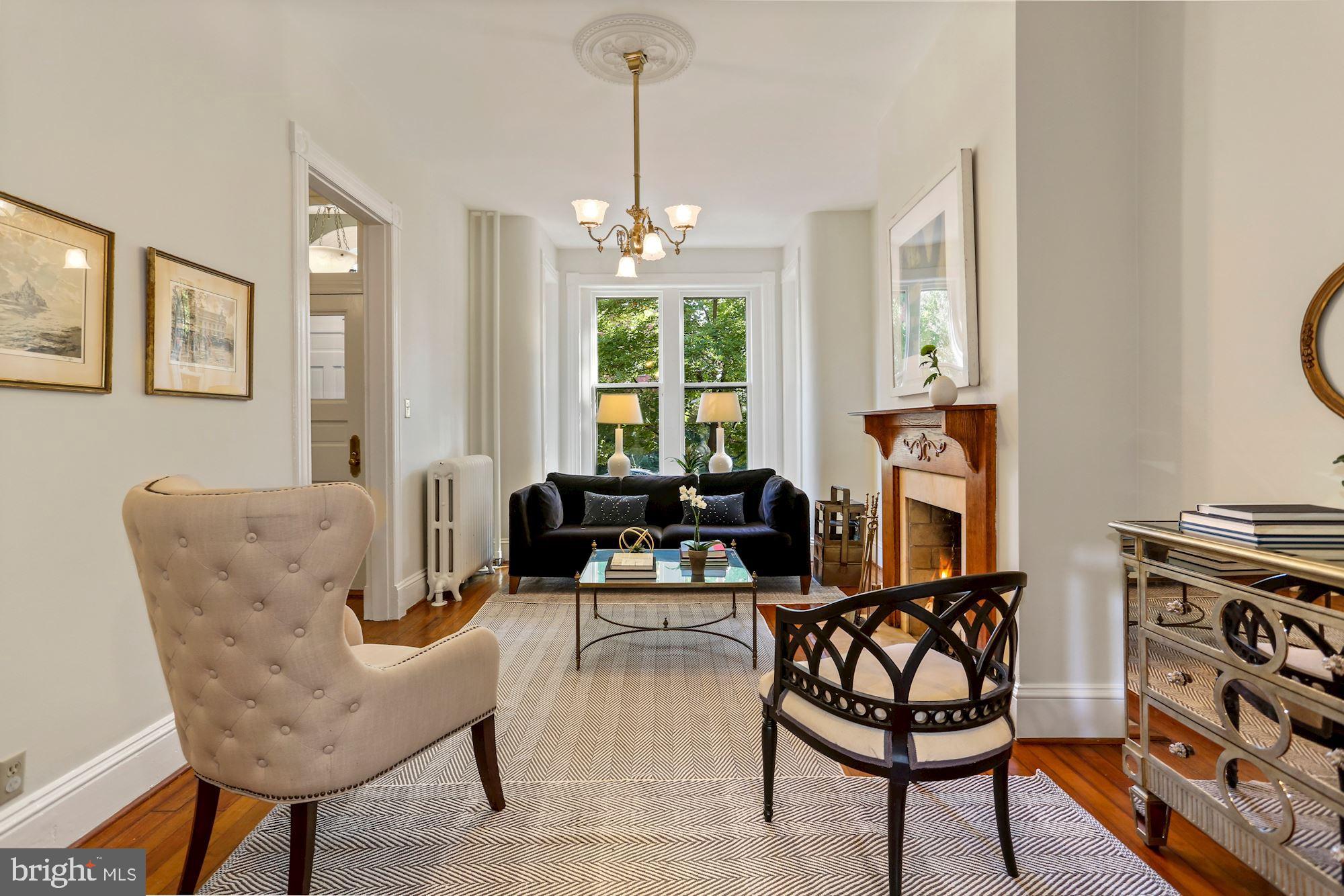 107 5th Street Southeast Washington, DC 20003 - Photo 4 of 32 Elegant formal living room with wood burning FP