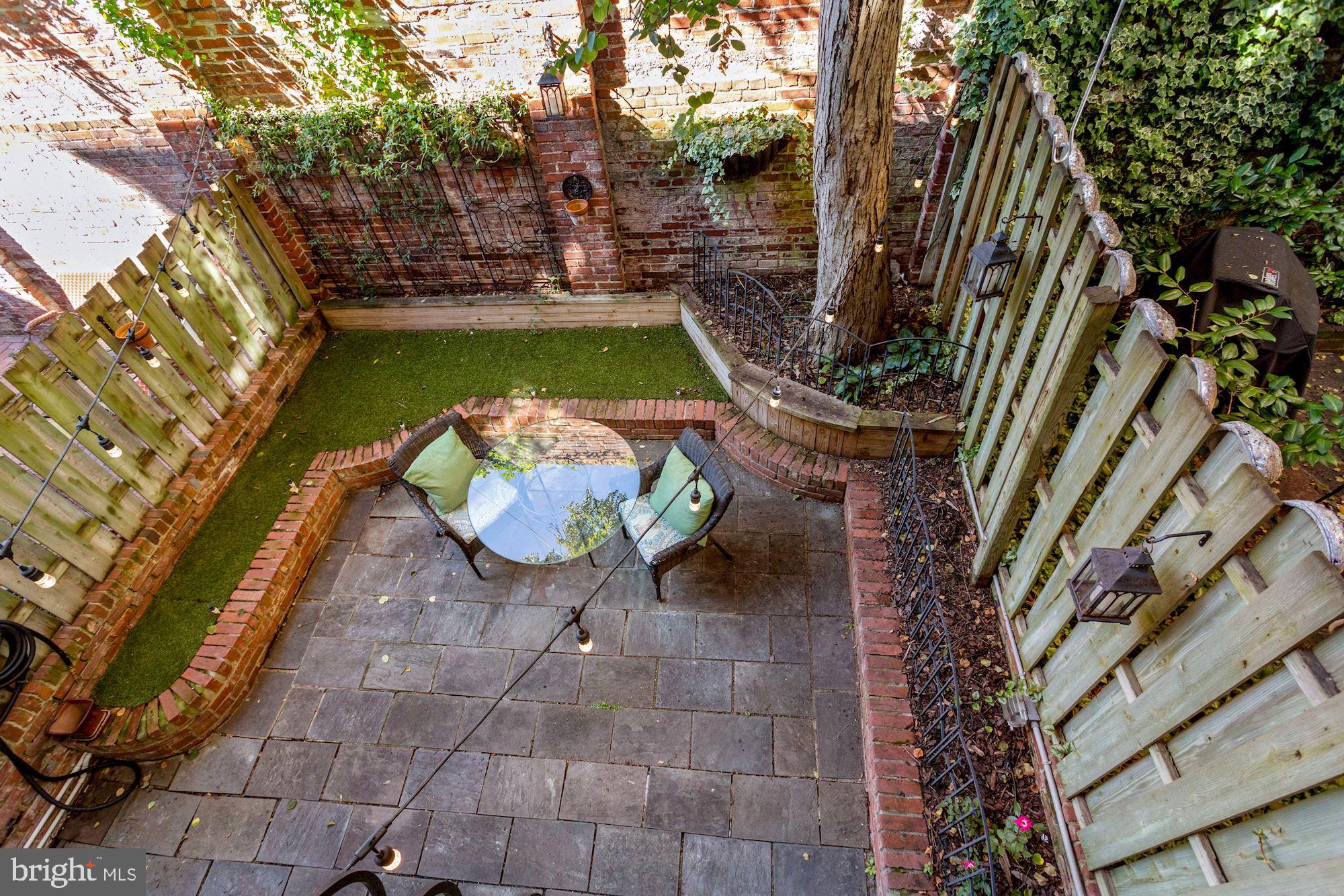 107 5th Street Southeast Washington, DC 20003 - Photo 7 of 32 Juliet balcony looks into the English garden