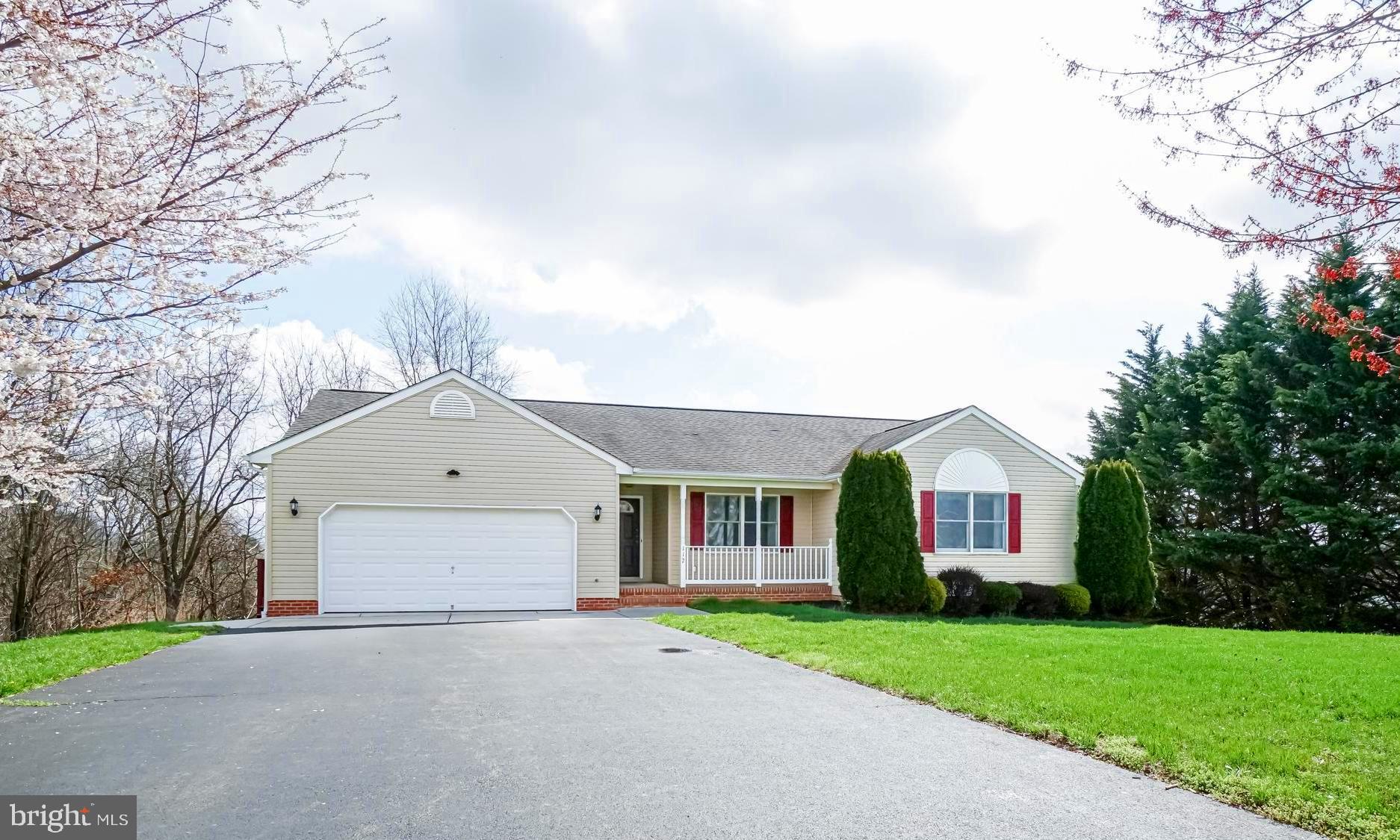 112 Turtleback Court Rising Sun, MD 21911 - Photo 2 of 23 a front view of a house with a yard and garage