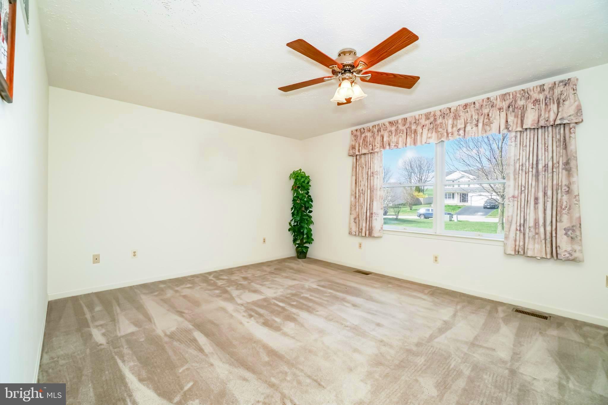 112 Turtleback Court Rising Sun, MD 21911 - Photo 14 of 23 a view of a big room with wooden floor and windows