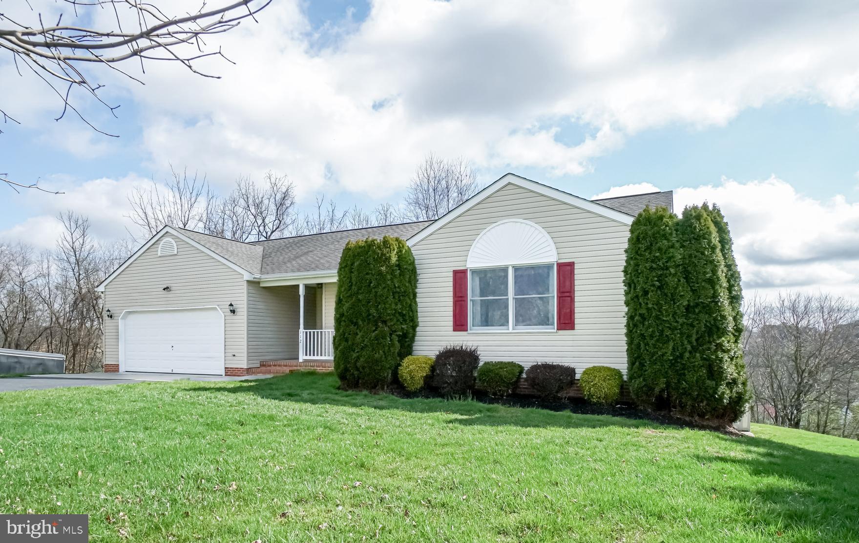 112 Turtleback Court Rising Sun, MD 21911 - Photo 22 of 23 a front view of a house with garden