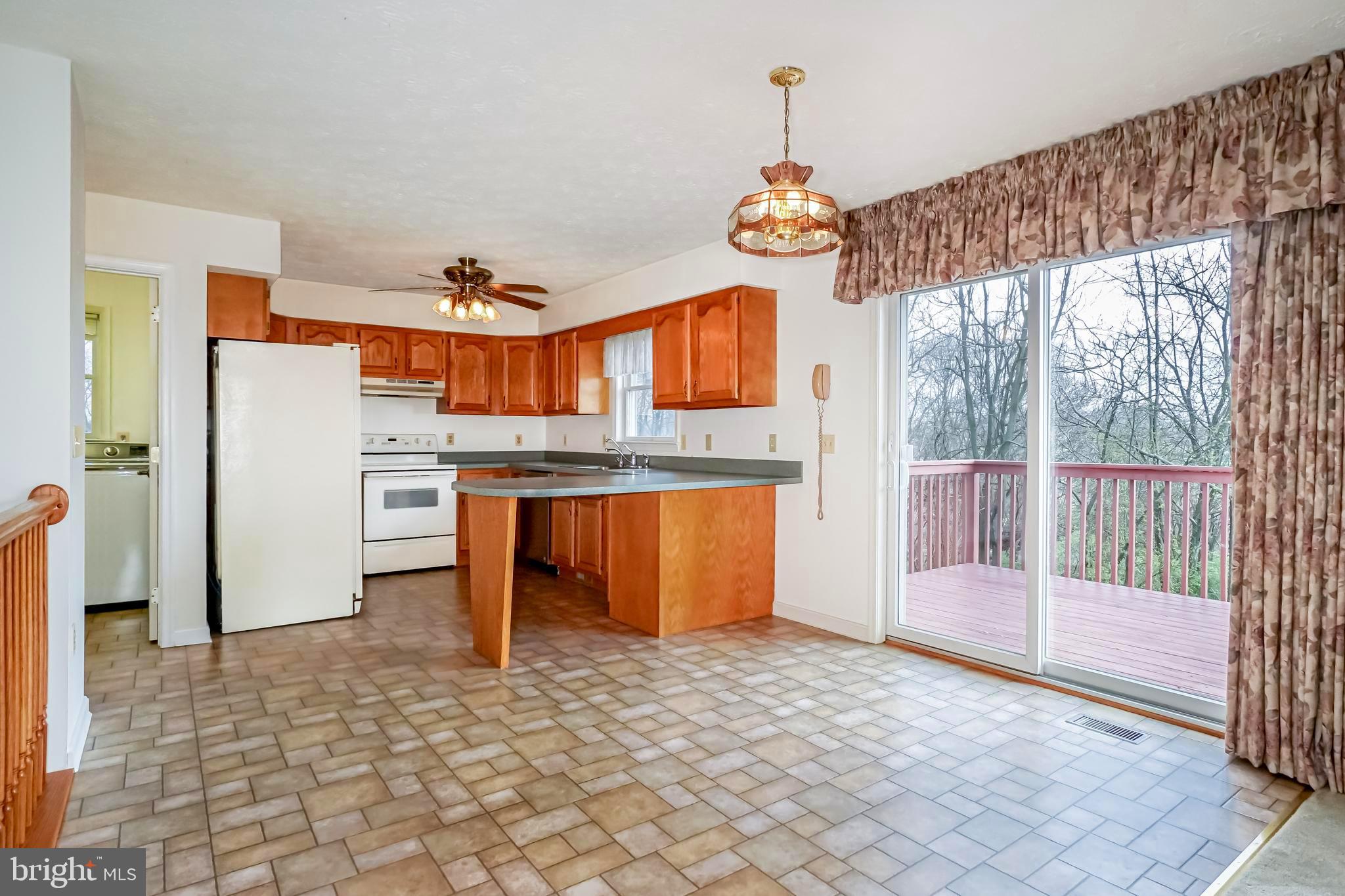 112 Turtleback Court Rising Sun, MD 21911 - Photo 5 of 23 a view of kitchen with refrigerator and cabinets