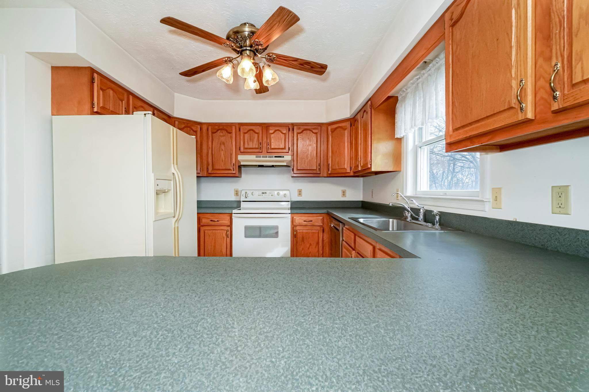 112 Turtleback Court Rising Sun, MD 21911 - Photo 9 of 23 a view of a kitchen with a sink cabinets and a kitchen