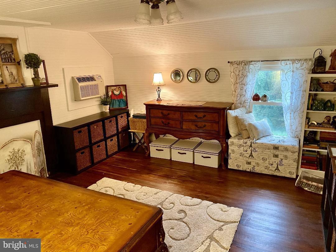 17648 Canby Road Leesburg, VA 20175 - Photo 11 of 12 a living room with furniture and wooden floor