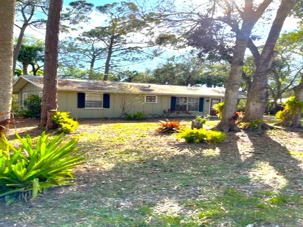 a view of a house with swimming pool