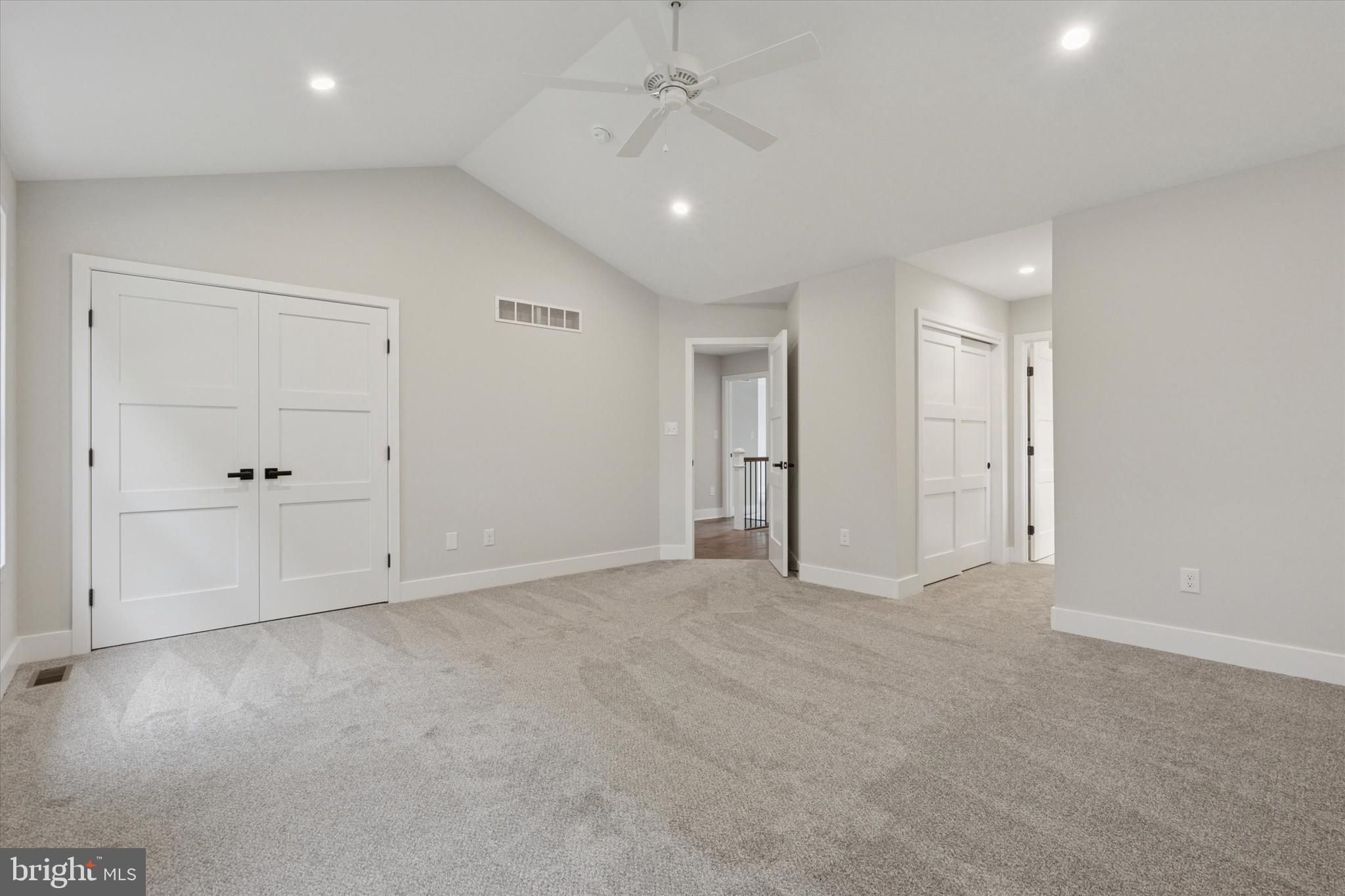 721 Walden Road Cheltenham, PA 19012 - Photo 17 of 25 an empty room with fan and entrance