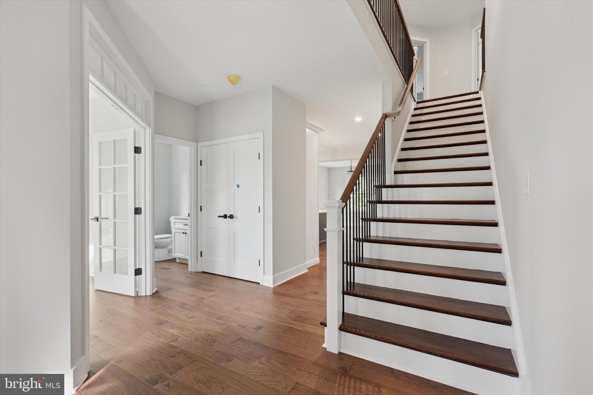 721 Walden Road Cheltenham, PA 19012 - Photo 2 of 25 a view of entryway with stairs and wooden floor