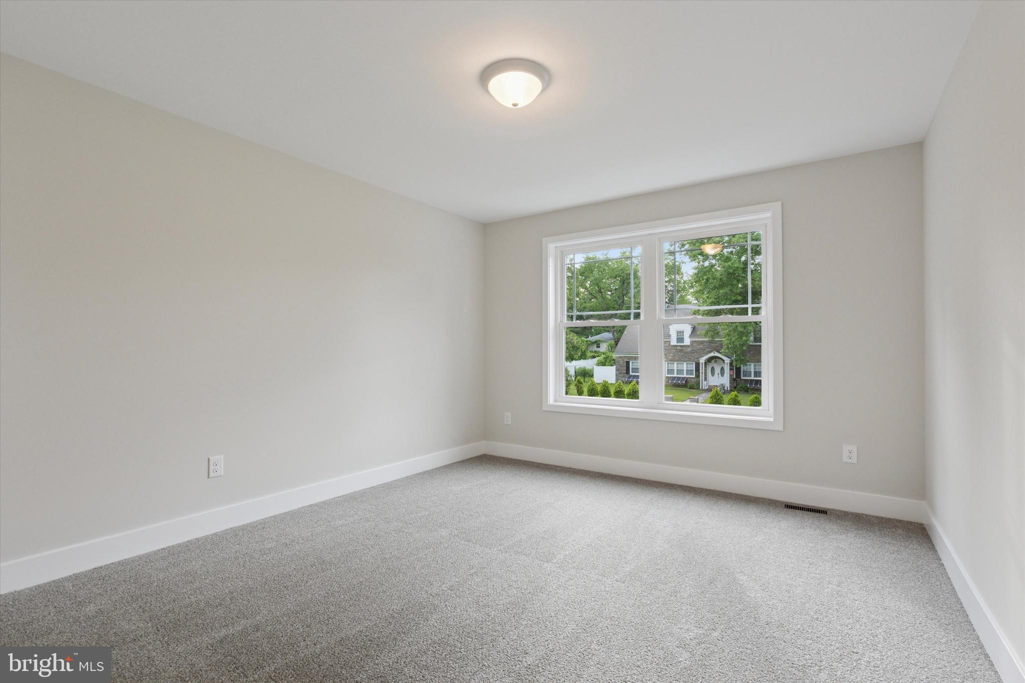 721 Walden Road Cheltenham, PA 19012 - Photo 21 of 25 an empty room with a window