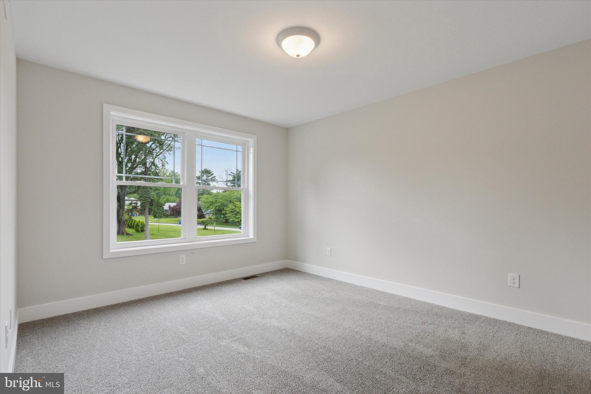 721 Walden Road Cheltenham, PA 19012 - Photo 23 of 25 an empty room with a window
