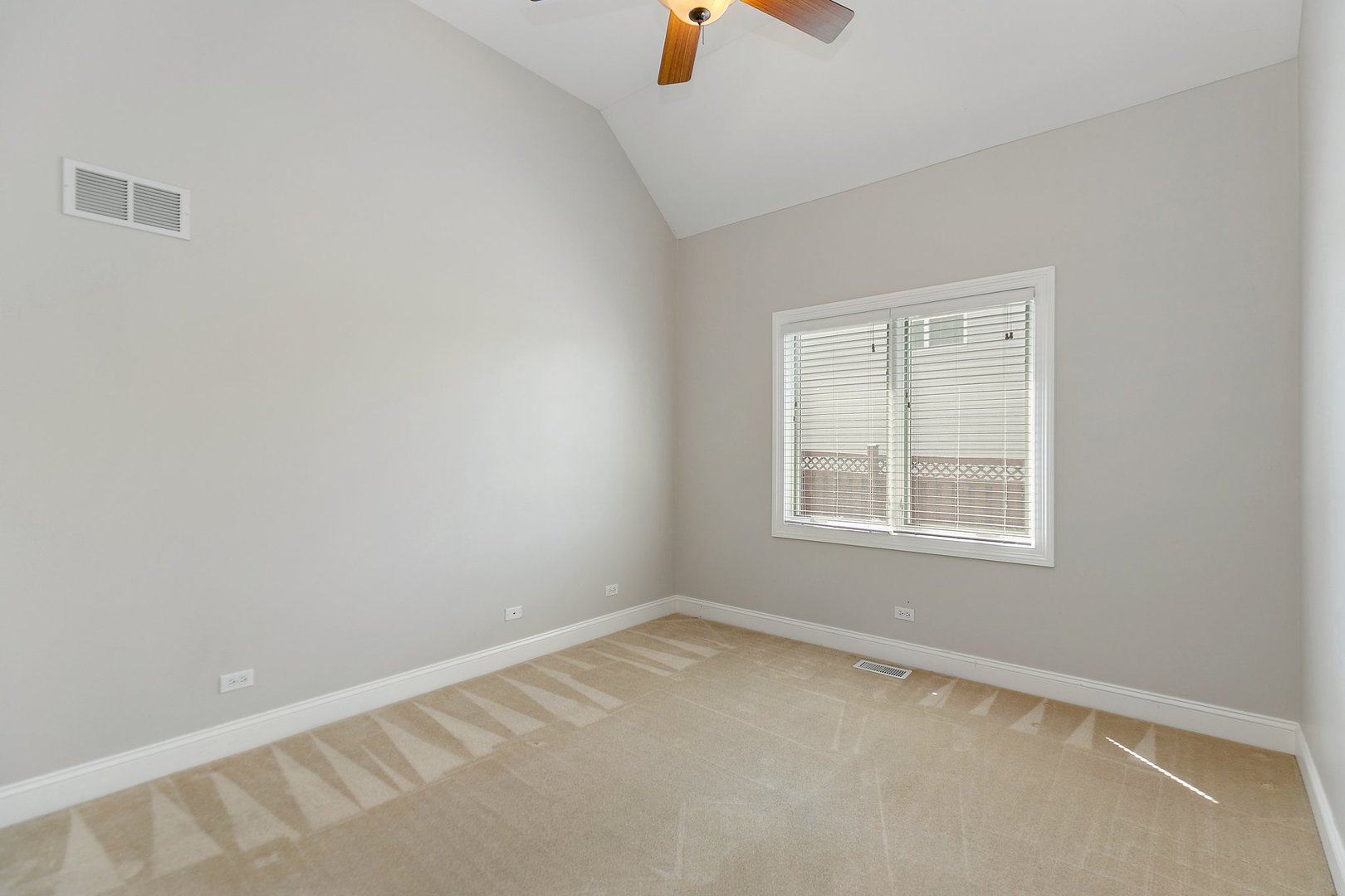 2073 Westover Road North Aurora, IL 60542 - Photo 18 of 24 an empty room with a window