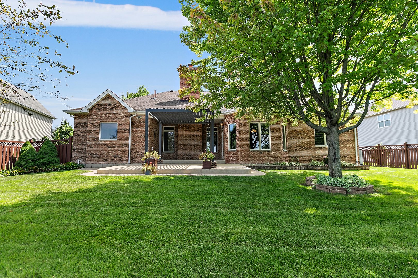 2073 Westover Road North Aurora, IL 60542 - Photo 2 of 24 a house view with a sitting space and garden