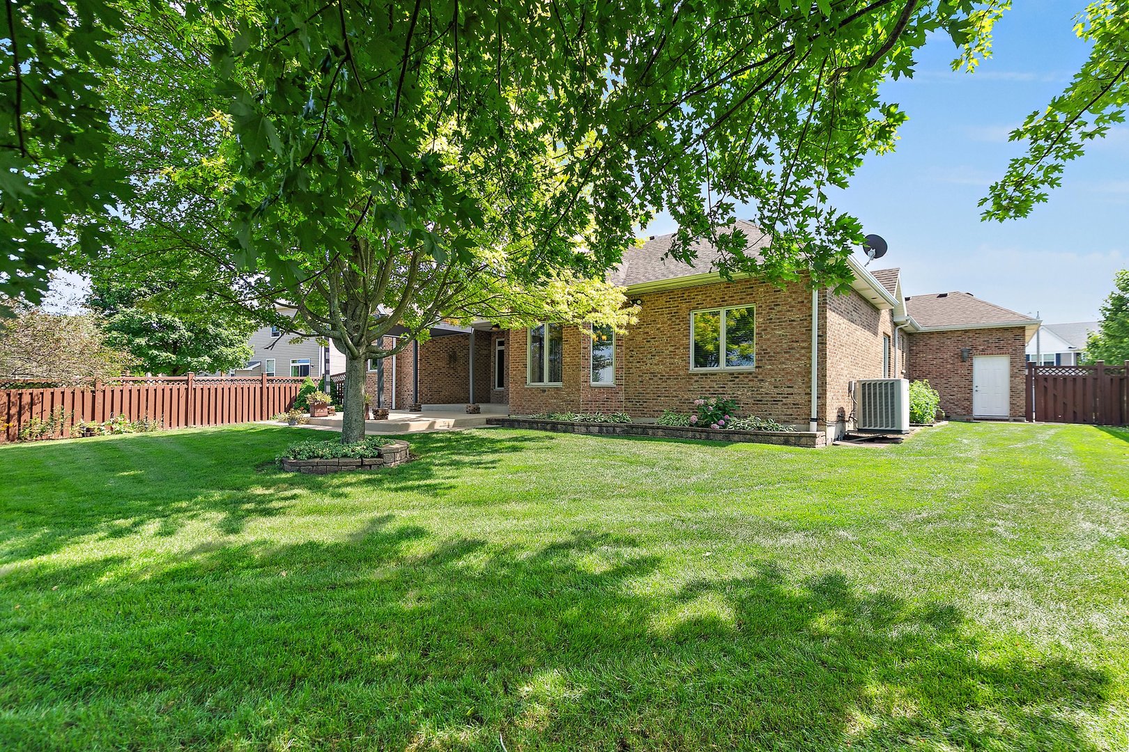 2073 Westover Road North Aurora, IL 60542 - Photo 22 of 24 a front view of house with yard and green space