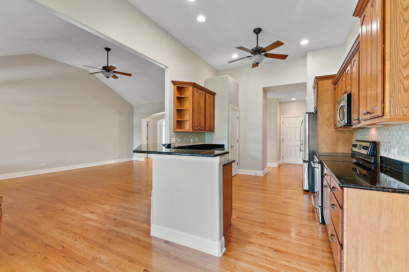 2073 Westover Road North Aurora, IL 60542 - Photo 8 of 24 a view of a kitchen with a sink and microwave