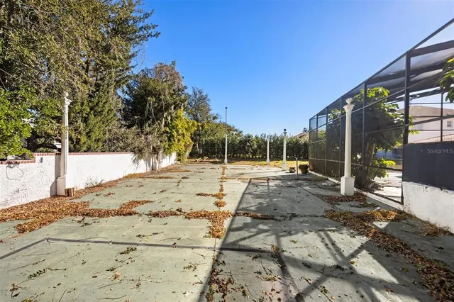 a view of yard with patio