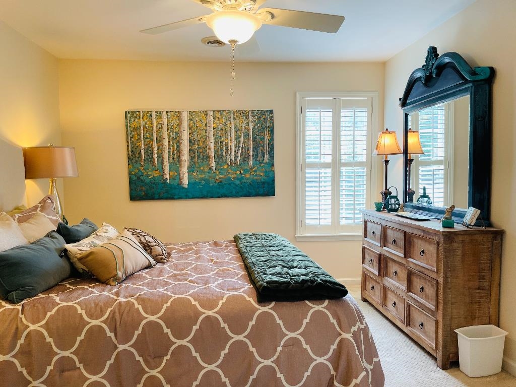 106 Mindy Circle Collierville, TN 38017 - Photo 16 of 25 a bedroom with a bed and a window