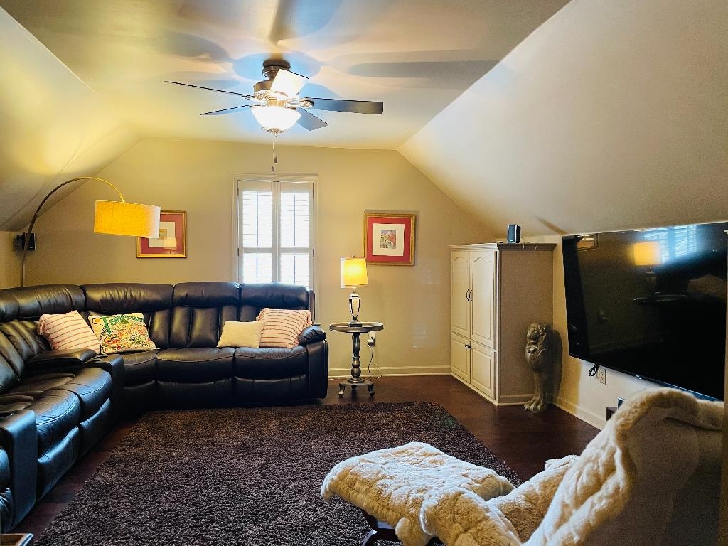 106 Mindy Circle Collierville, TN 38017 - Photo 20 of 25 a living room with furniture and a flat screen tv