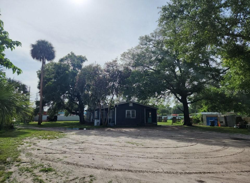 1007 Northeast 25th Street Ocala, FL 34470 - Photo 9 of 9 a front view of a house with a yard