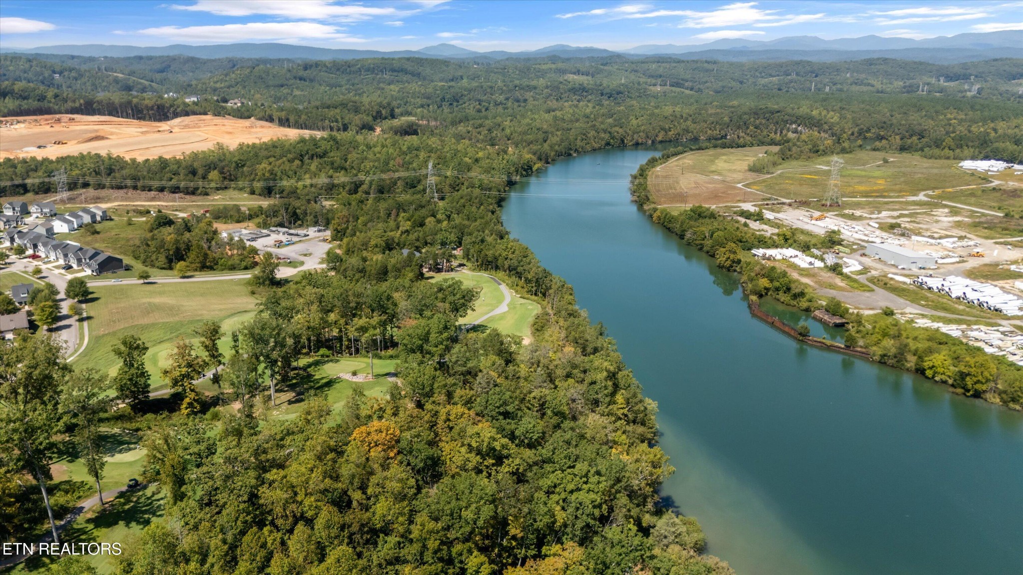 100 Juniperberry Road Oak Ridge, TN 37830 - Photo 43 of 50 a view of a lake with a yard
