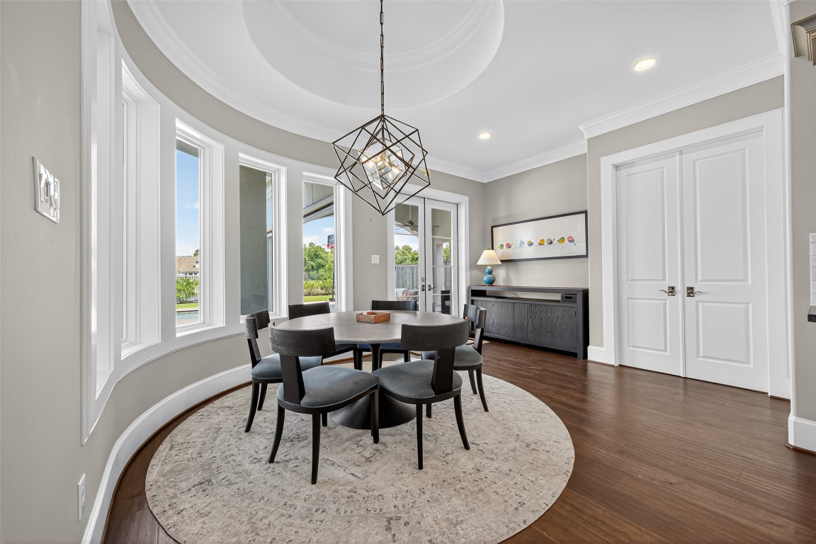 6806 West Warwick Lake Lane Spring, TX 77389 - Photo 18 of 50 Separate breakfast area overlooking the lake and the pool.