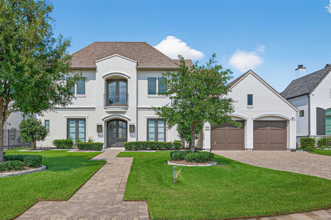 6806 West Warwick Lake Lane Spring, TX 77389 - Photo 2 of 50 Beautifully manicured front yard