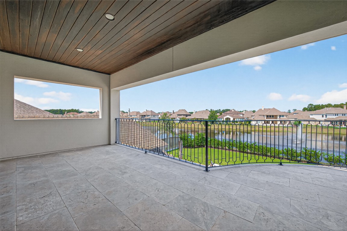 6806 West Warwick Lake Lane Spring, TX 77389 - Photo 43 of 50 Huge balcony to enjoy the view of the lake on the hammock or just watch the sunset with your loved ones