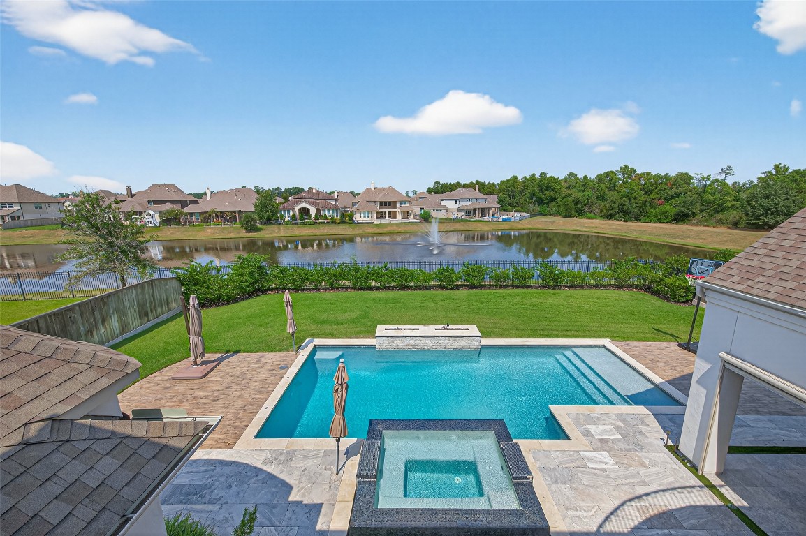 6806 West Warwick Lake Lane Spring, TX 77389 - Photo 44 of 50 View of the pool and lake from the balcony