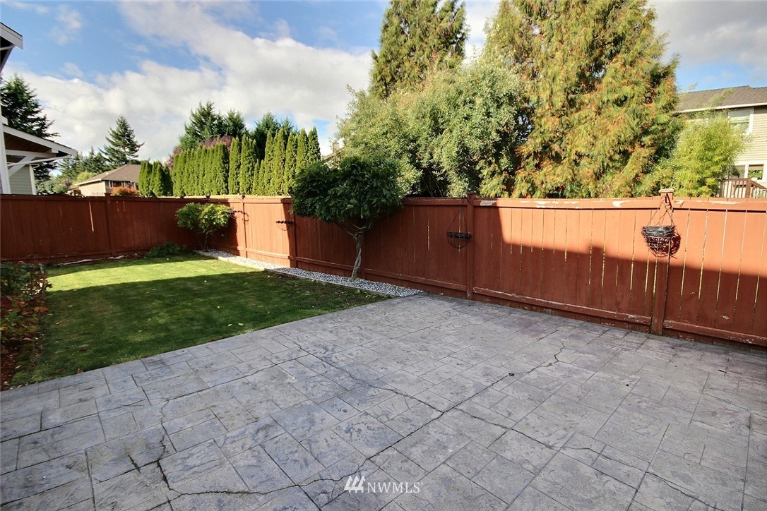 12946 Southeast 216th Place Kent, WA 98031 - Photo 32 of 39 a view of a backyard
