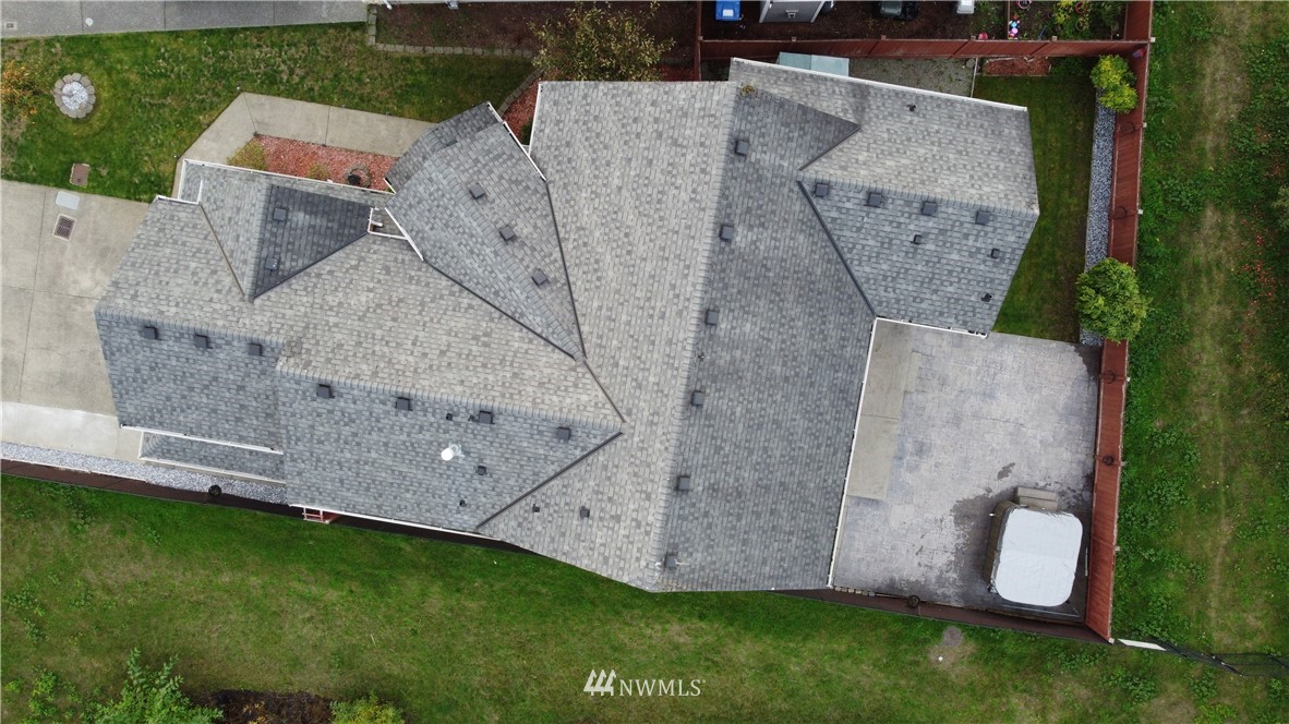 12946 Southeast 216th Place Kent, WA 98031 - Photo 37 of 39 an aerial view of a house with a yard