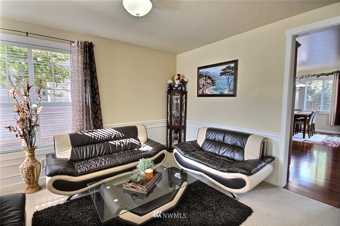 12946 Southeast 216th Place Kent, WA 98031 - Photo 5 of 39 a living room with furniture rug and window