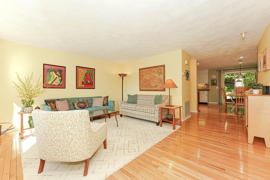 9 Apple Ridge Road, Unit 4 Maynard, MA 01754 - Photo 7 of 33 a living room with furniture and a table