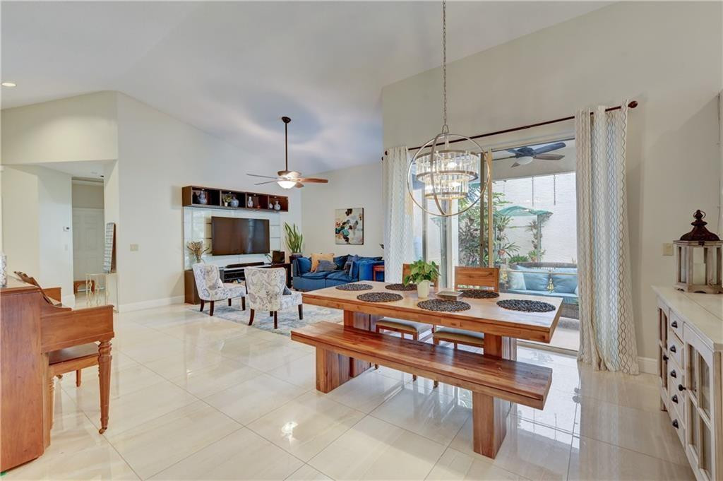 8171 Hampton Wood Drive Boca Raton, FL 33433 - Photo 9 of 56 a room with furniture pool table and flat screen tv