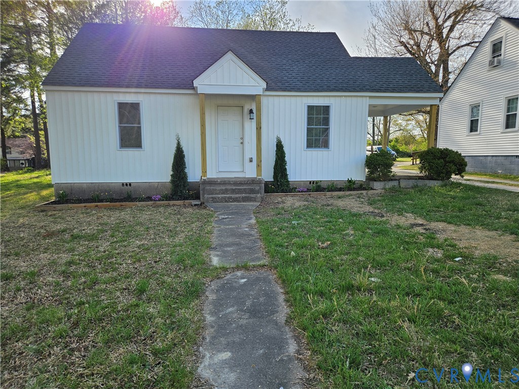 47 Ridge Road Blackstone, VA 23824 - Photo 1 of 23 a front view of a house with garden