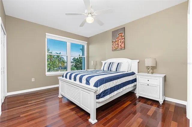 a view of a room with a floor to ceiling window and garden