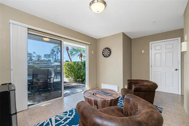 a view of swimming pool with seating area