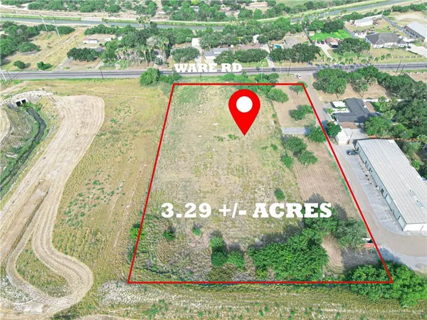 a view of swimming pool with a garden and seating area