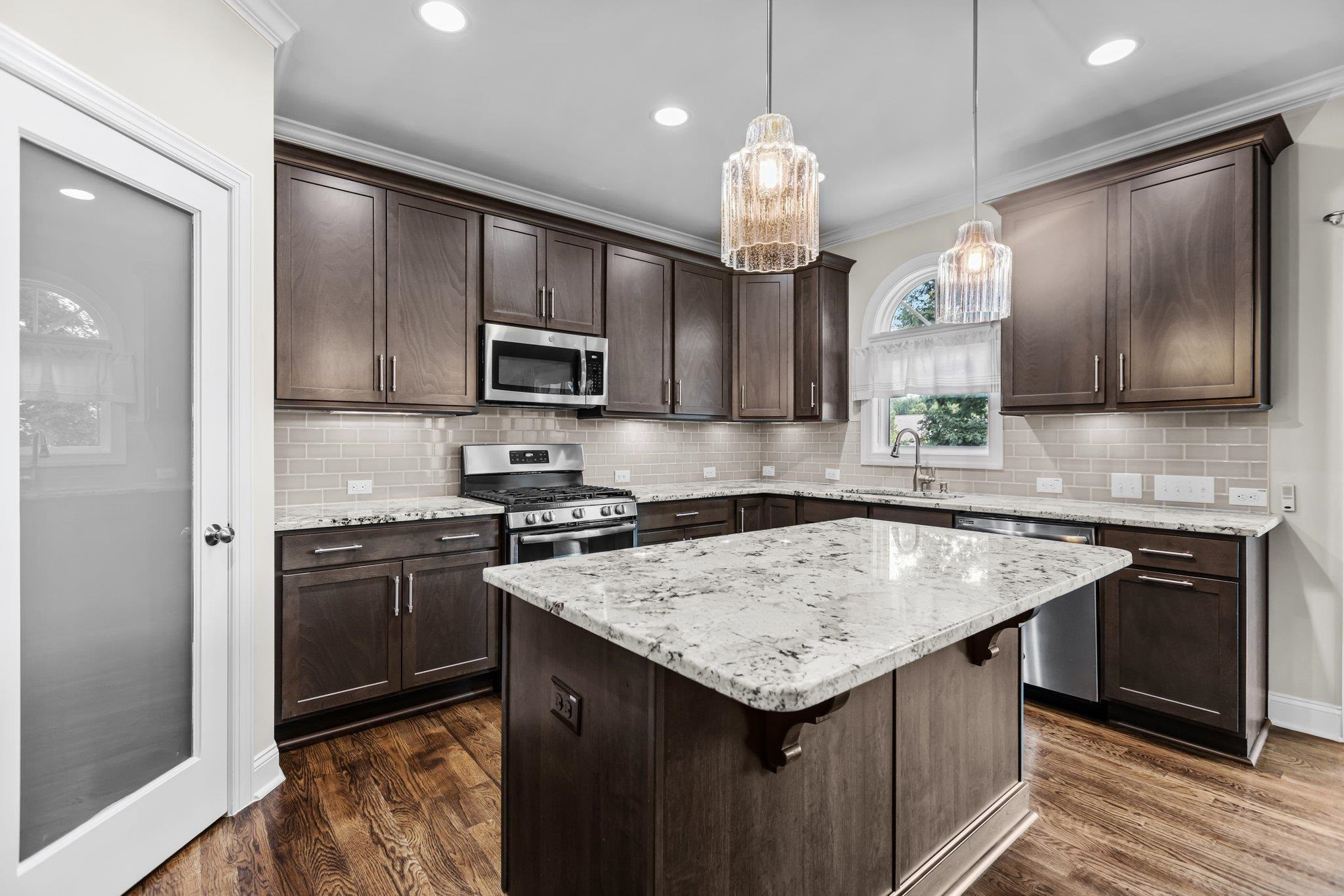 357 Marshcroft Way Rolesville, NC 27571 - Photo 14 of 52 a kitchen with a sink stove and refrigerator