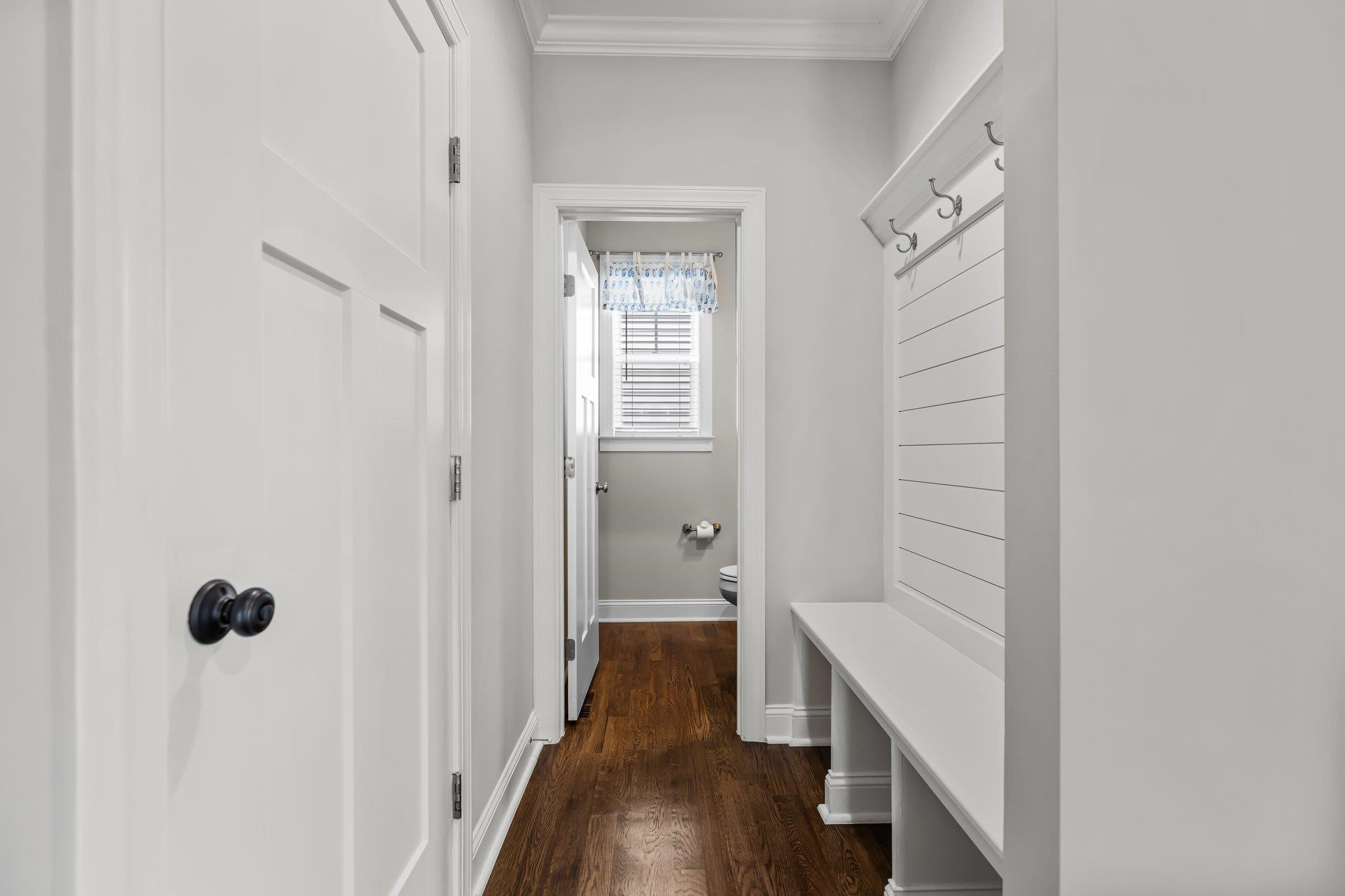 357 Marshcroft Way Rolesville, NC 27571 - Photo 19 of 52 a view of a hallway with wooden floor and staircase