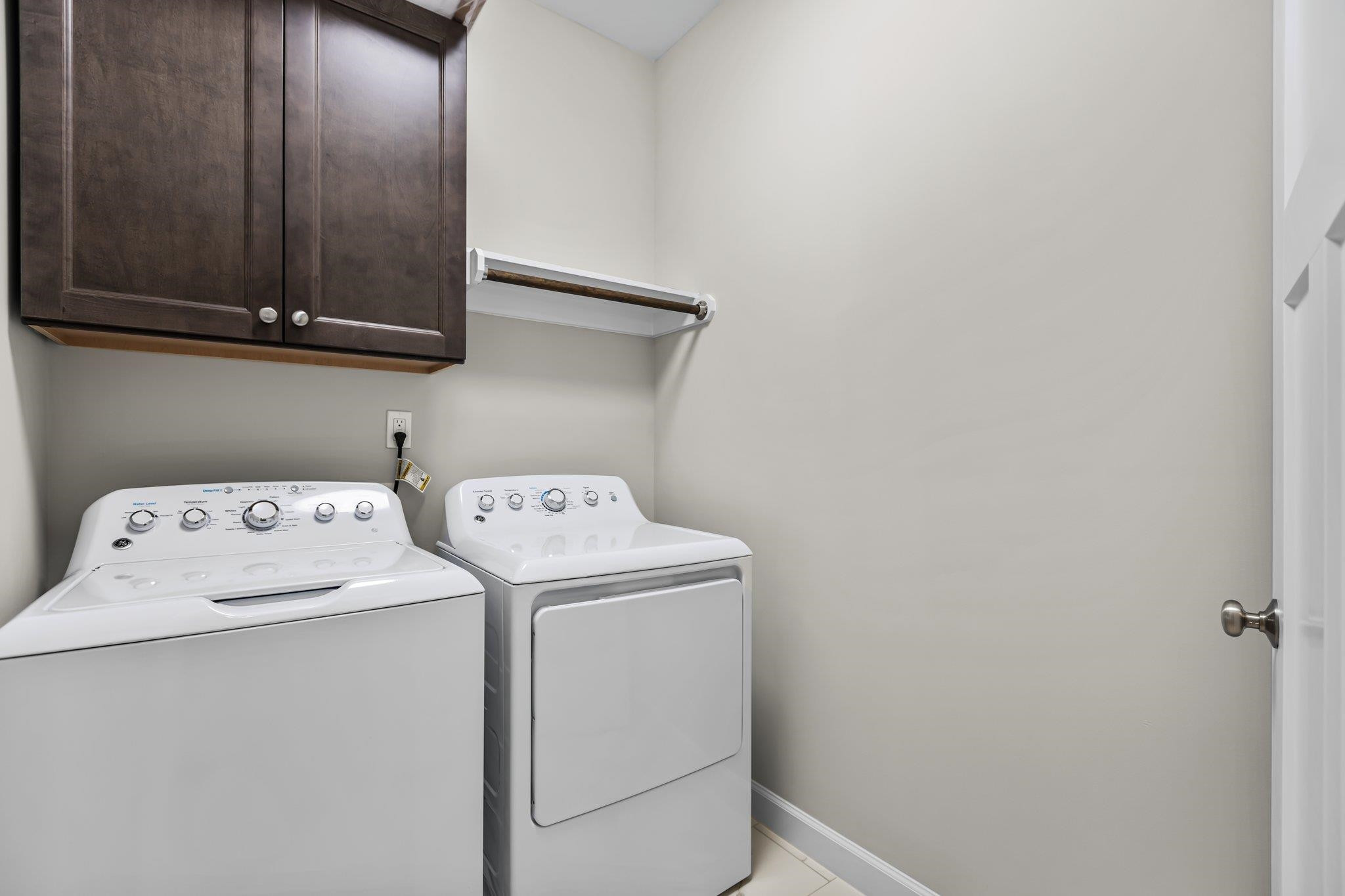 357 Marshcroft Way Rolesville, NC 27571 - Photo 25 of 52 a utility room with dryer and washer