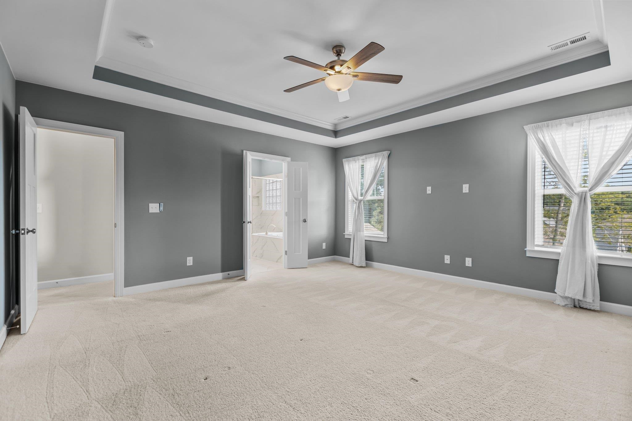 357 Marshcroft Way Rolesville, NC 27571 - Photo 26 of 52 a view of a livingroom with a ceiling fan and window
