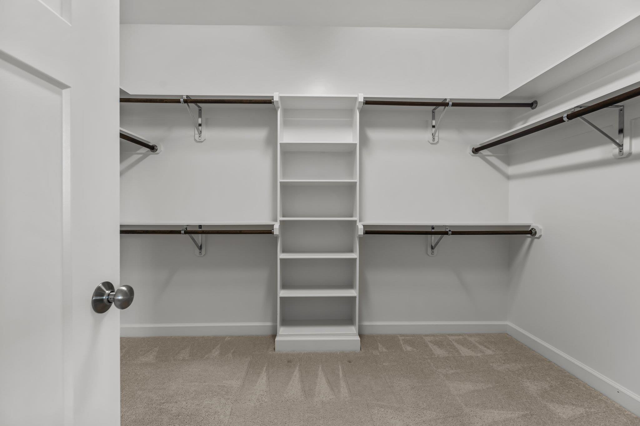 357 Marshcroft Way Rolesville, NC 27571 - Photo 31 of 52 a view of an empty walk in closet