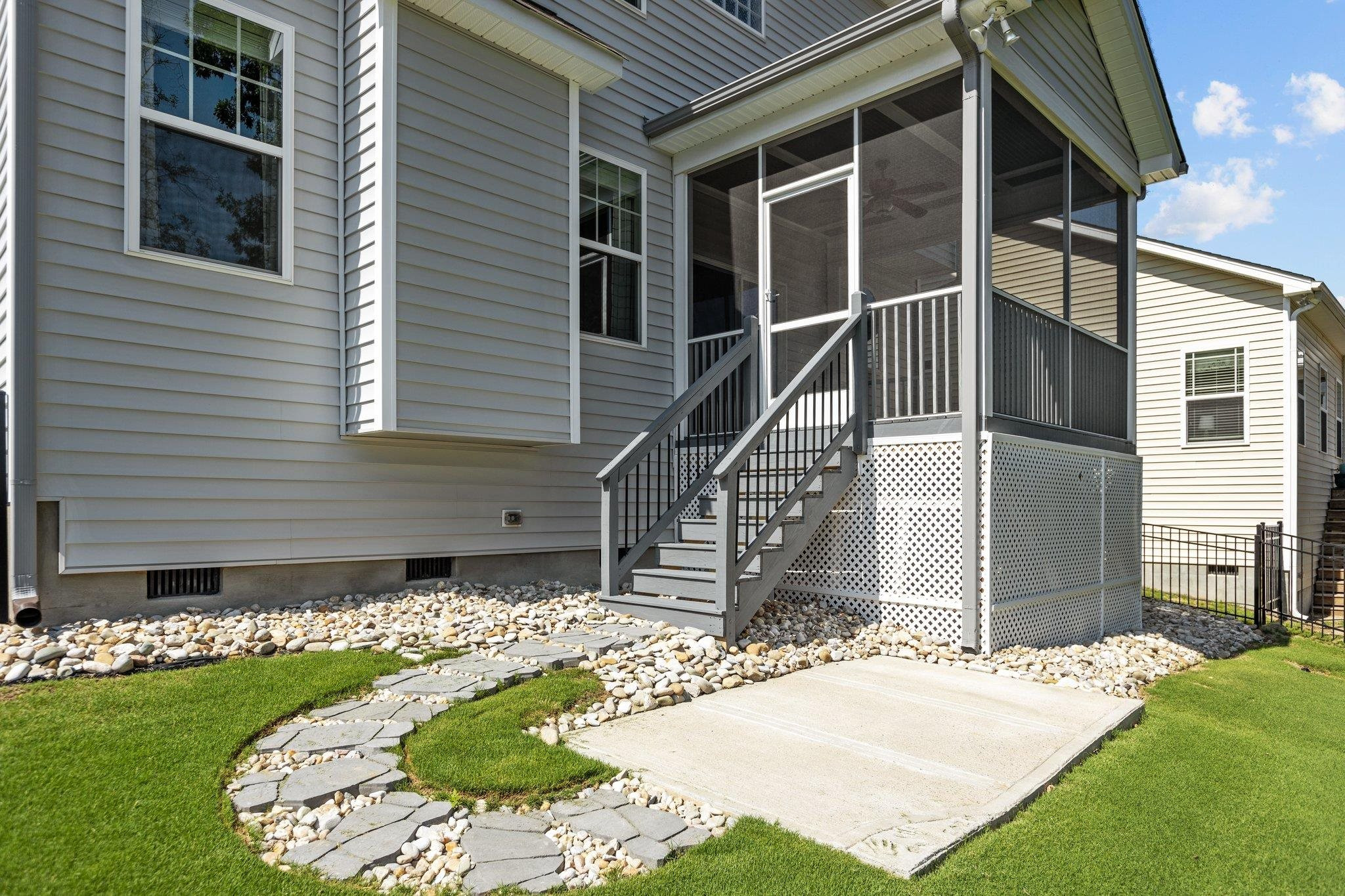 357 Marshcroft Way Rolesville, NC 27571 - Photo 45 of 52 a front view of a house with a garden and porch