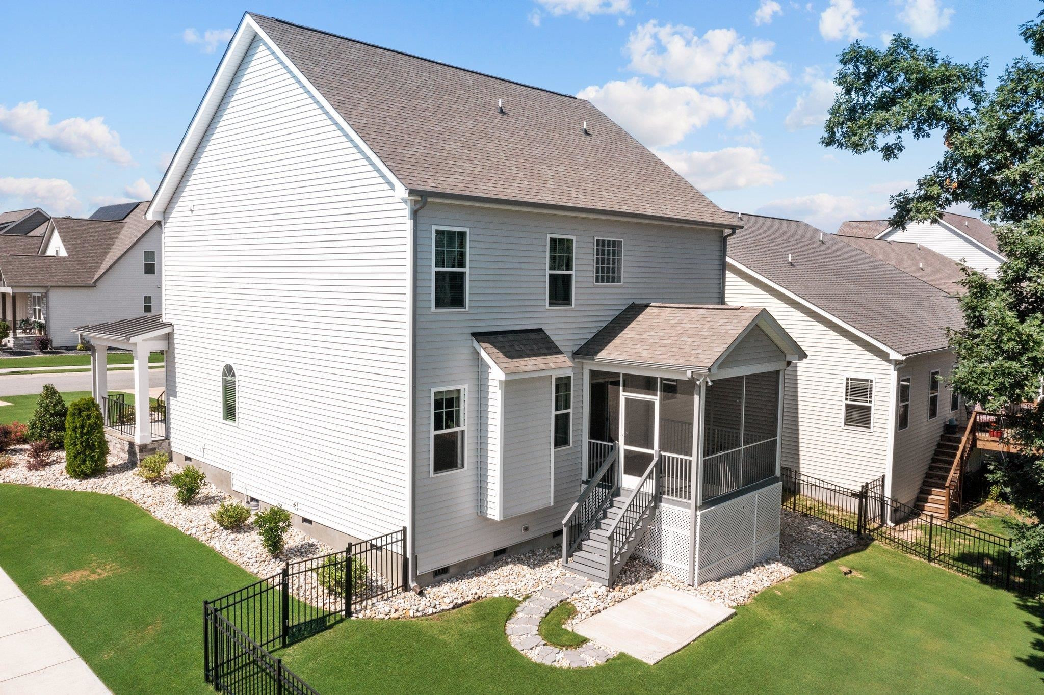 357 Marshcroft Way Rolesville, NC 27571 - Photo 46 of 52 a front view of a house with garden