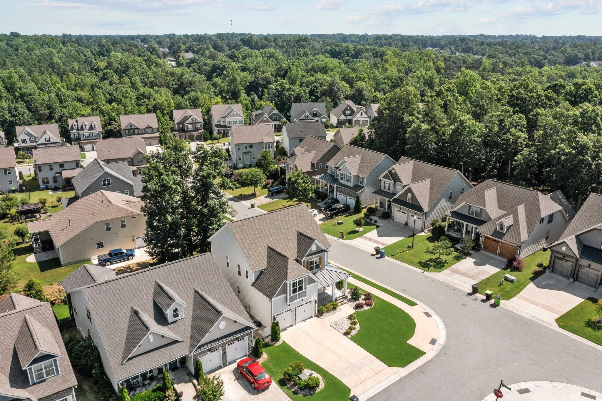 357 Marshcroft Way Rolesville, NC 27571 - Photo 48 of 52 an aerial view of multiple houses with yard
